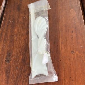Vintage Barbie Accessories Set.
Hair brush, white high heels and prop stand.